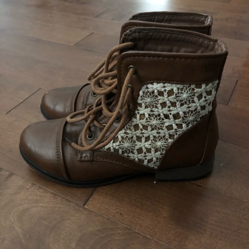 Brown combat boot with crochet lace
